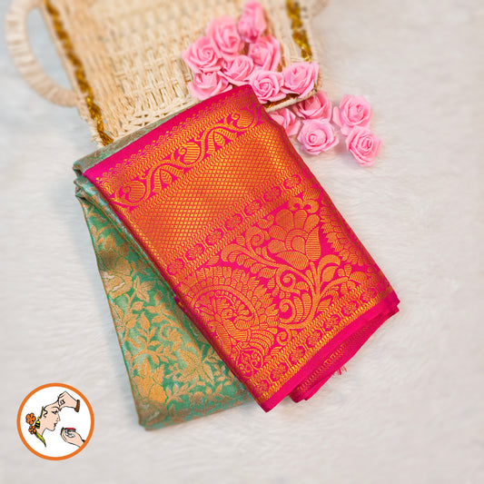 Pista/Sea Green with Pink border Kanchipuram Tissue Silk Saree with Intricate Floral & Vine patters