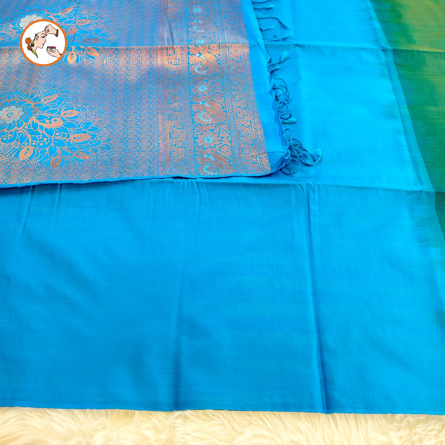 Peacocok Green with Blue borderless Soft Silk Saree with Peacock butta