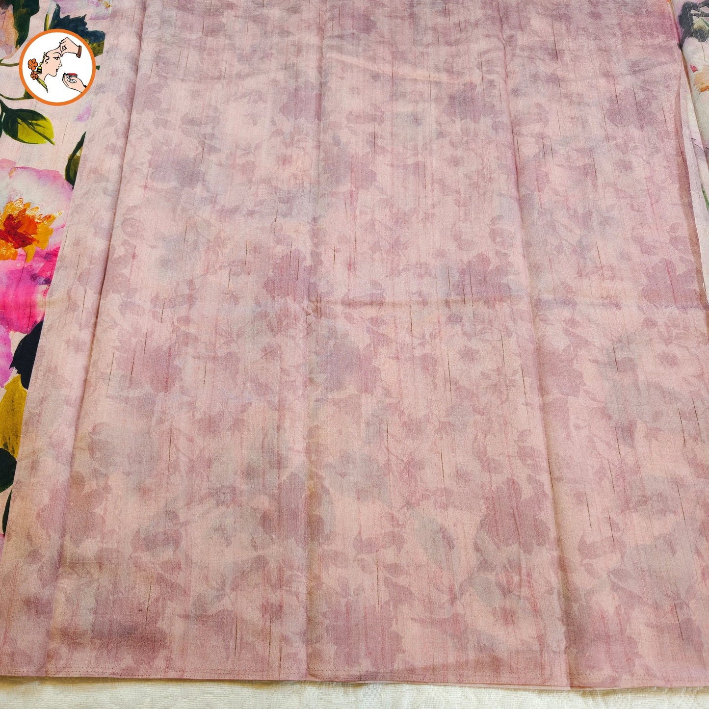 Elegant floral pallu detail of baby pink tussar saree