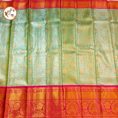 Pista/Sea Green with Pink border Kanchipuram Tissue Silk Saree with Intricate Floral & Vine patters