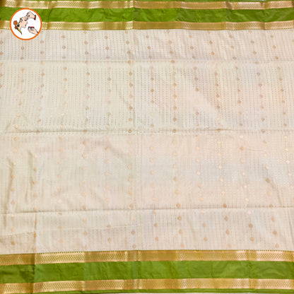 Off white Rain drop design with Parrot Green Retta Petta border Semi Soft Silk Saree