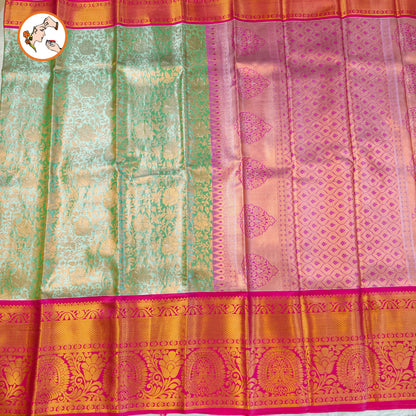 Pista/Sea Green with Pink border Kanchipuram Tissue Silk Saree with Intricate Floral & Vine patters