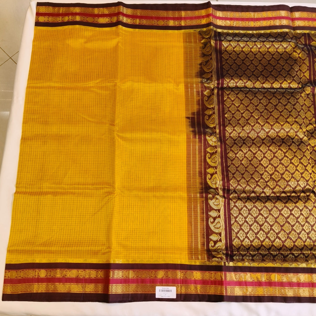 Yellow traditional Podi Kattam silk cotton saree