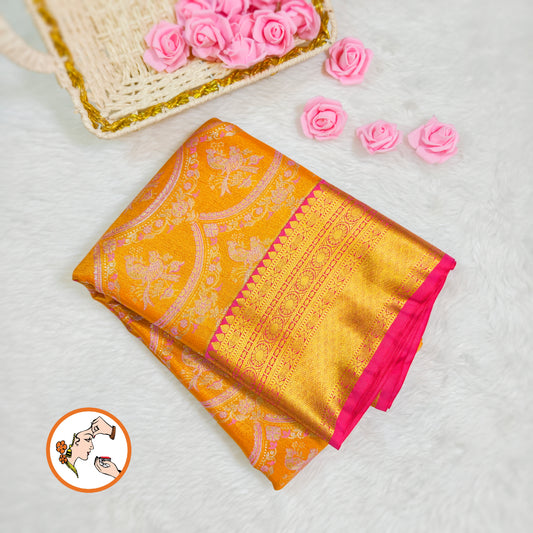 Mango Yellow with Pink border Kanchipuram Tissue Silk Saree