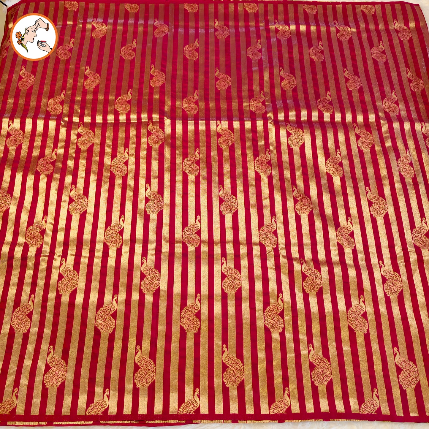 Maroon borderless golden stripes Peacock motif Fancy Silk Saree