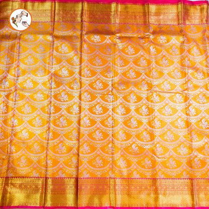 Mango Yellow with Pink border Kanchipuram Tissue Silk Saree