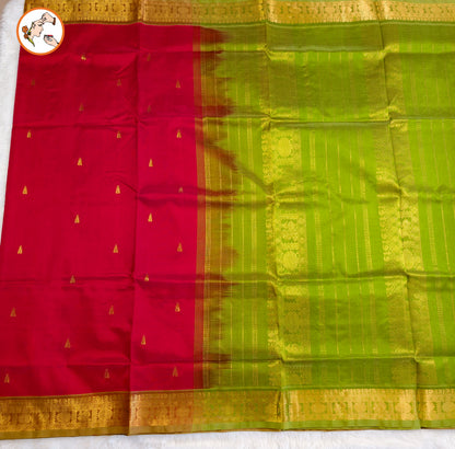 Red Traditional Pure Silk Cotton Saree with Green Peacock border