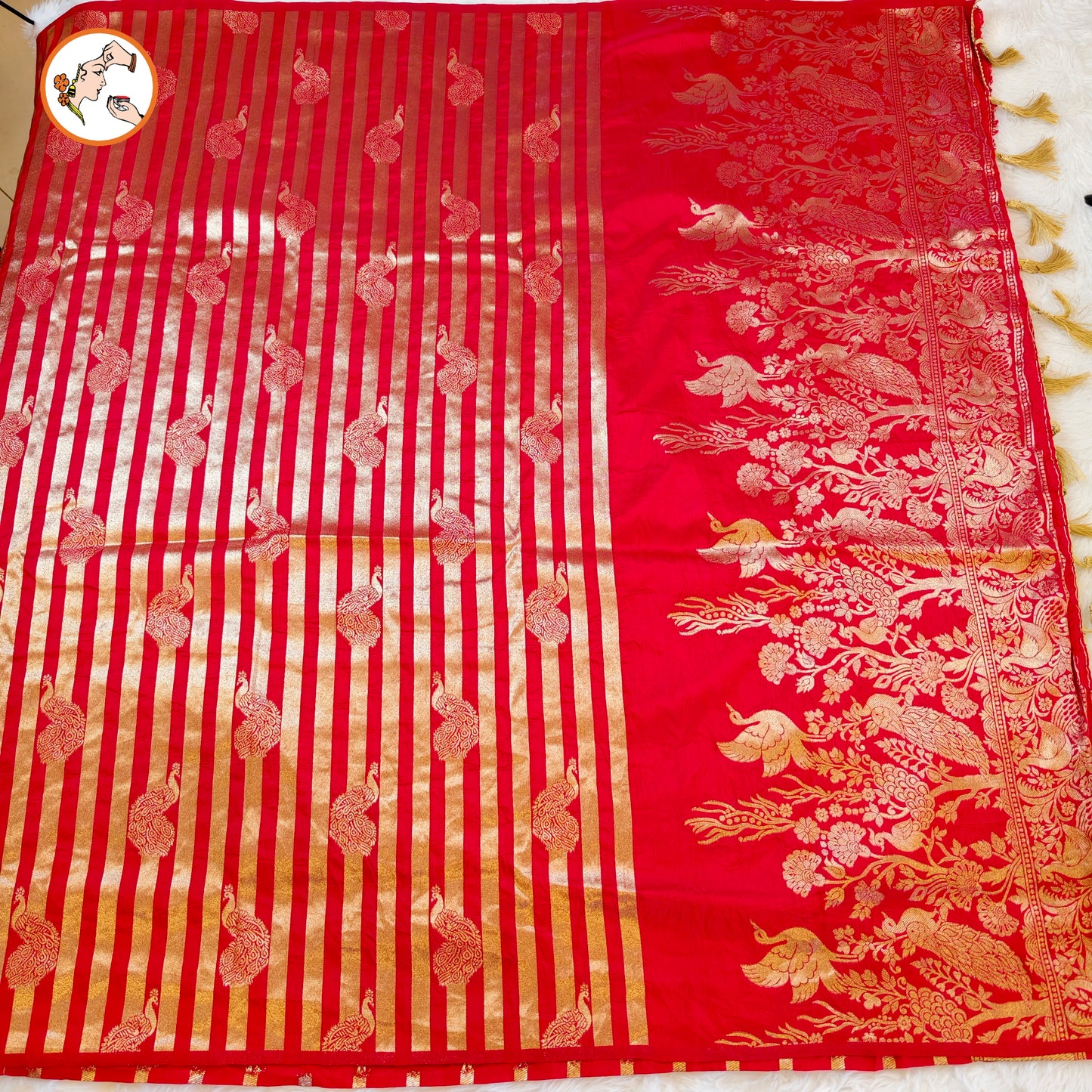 Red borderless Golden stripes Peacock motif Fancy Silk Saree