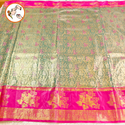 Dark Green with Magenta Floral border intricate Gold zari Floral weaving Kanchipuram Bridal High Tissue Silk Saree