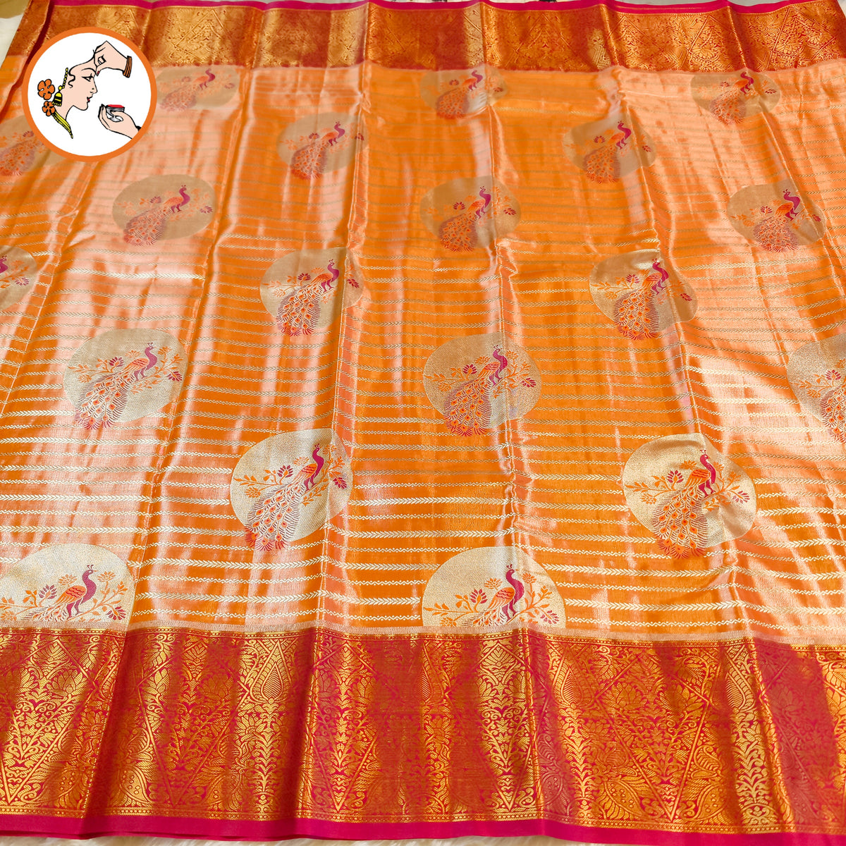 Peach with Magenta Pink border Peacock motif High Tissue Kanchipuram Silk Saree