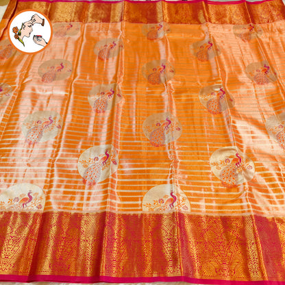 Peach with Magenta Pink border Peacock motif High Tissue Kanchipuram Silk Saree