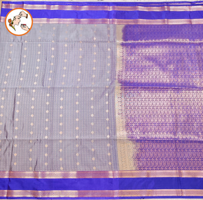 Greyish Blue with Blue Raindrop design Retta Petta border Semi Soft Silk Saree