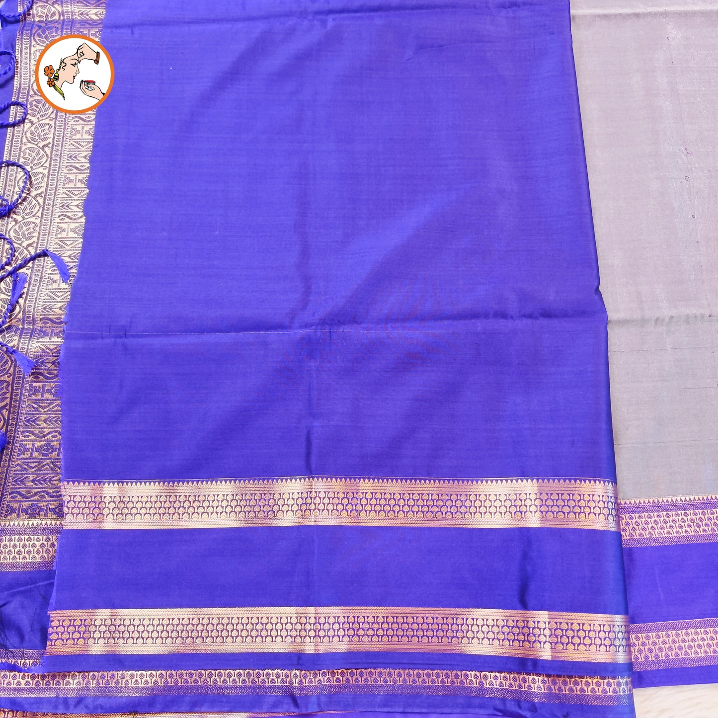 Greyish Blue with Blue Raindrop design Retta Petta border Semi Soft Silk Saree