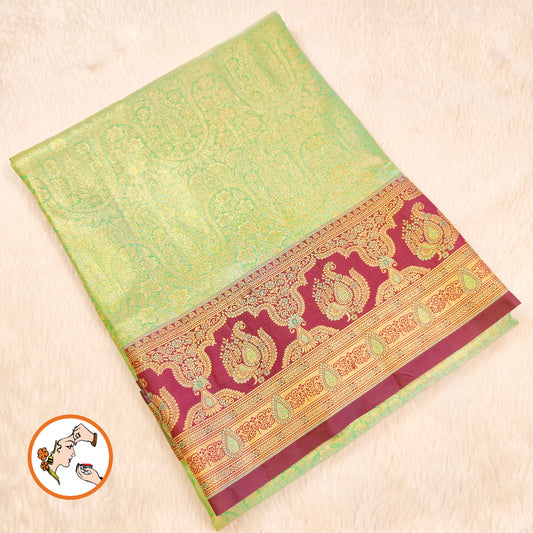Pista Green with Arakku border Meenakari weaving Kanchipuram High Tissue Silk Saree