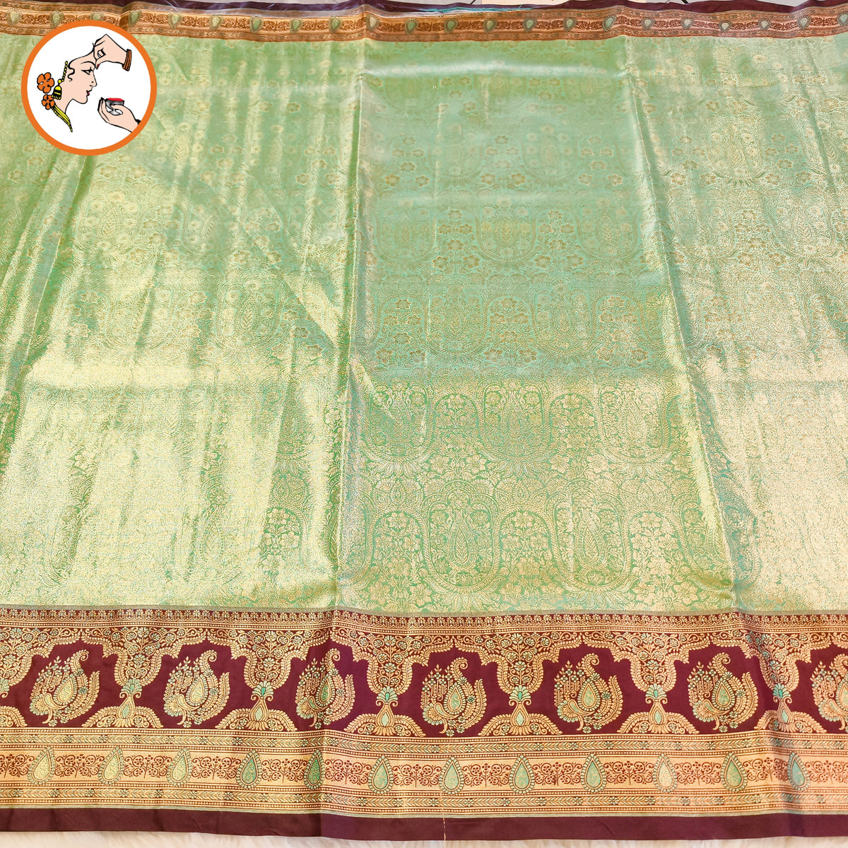 Pista Green with Arakku border Meenakari weaving Kanchipuram High Tissue Silk Saree