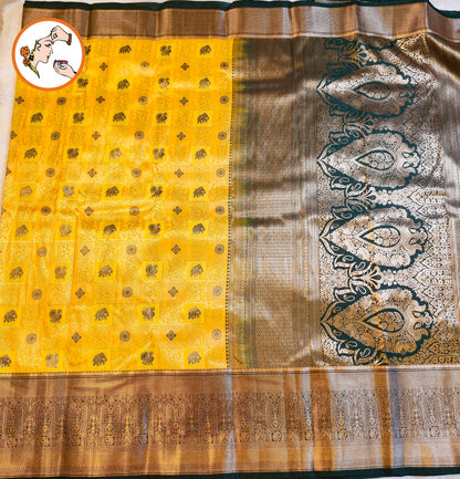 Light Yellow & Dark Green border Kanchiupuram Mix Silk Saree with Traditional checks(Kattam) & Mayil(Peacock) motif featuring intricate Gold zari work