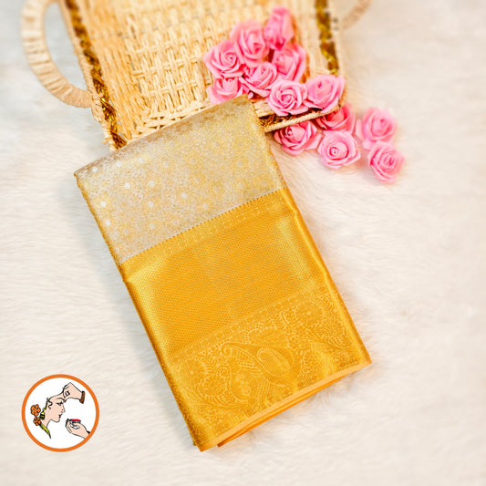 Off White with Gold border Kanchipuram Tissue Silk Saree