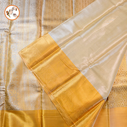 Off White with Gold border Kanchipuram Tissue Silk Saree