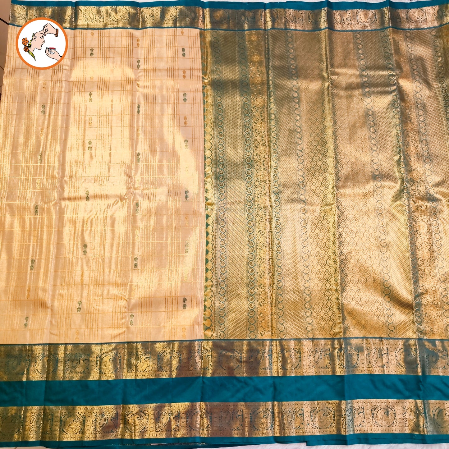 Off white with Peacock Blue border High Tissue Kanchipuram Semi Silk Saree