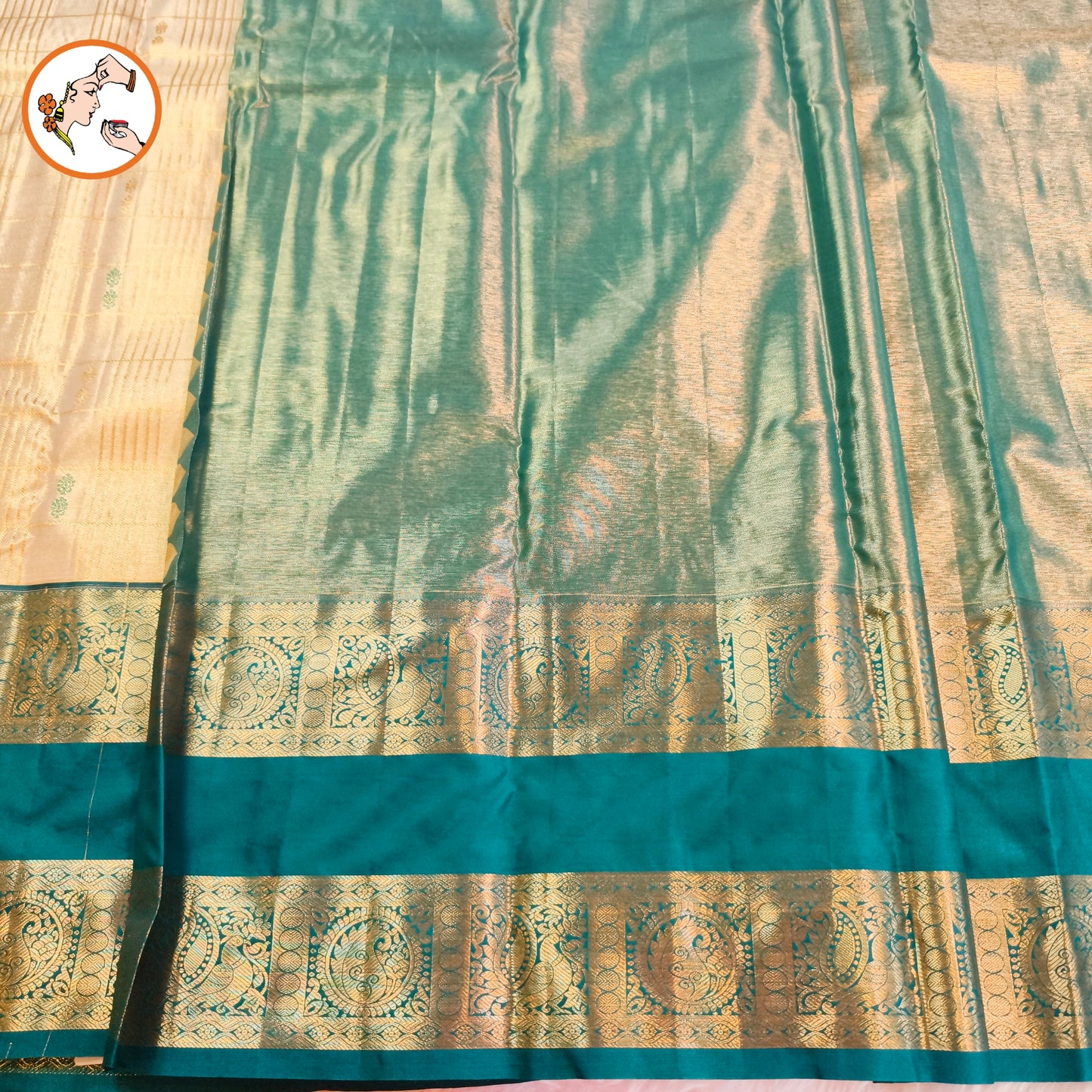 Off white with Peacock Blue border High Tissue Kanchipuram Semi Silk Saree