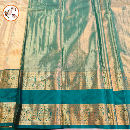 Off white with Peacock Blue border High Tissue Kanchipuram Semi Silk Saree