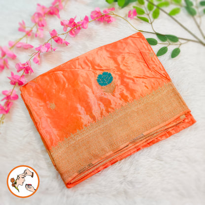 Kanakambaram Peach with delicate Floral buti subtly embrioded Banarasi katan Russian Silk Saree