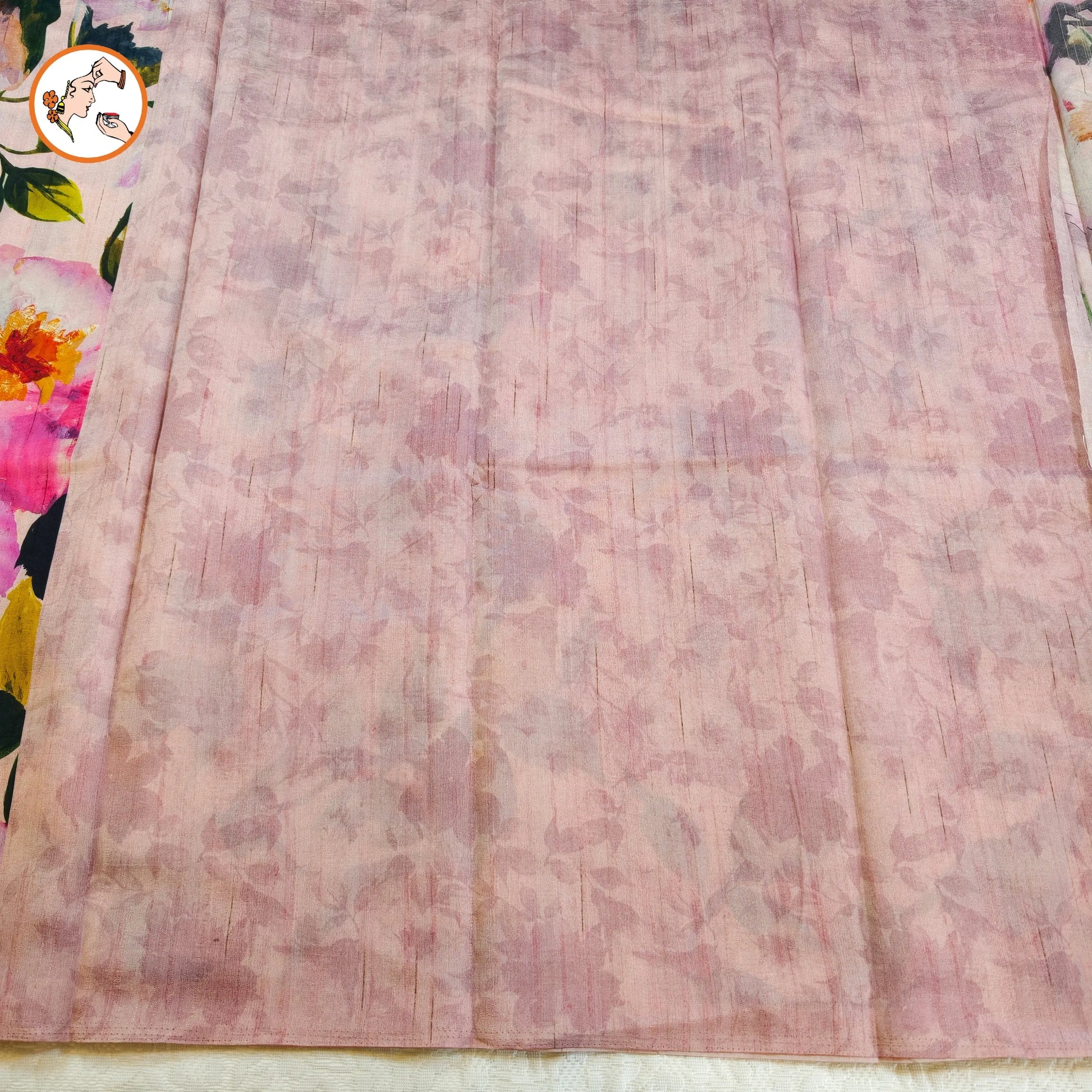 Elegant floral pallu detail of baby pink tussar saree