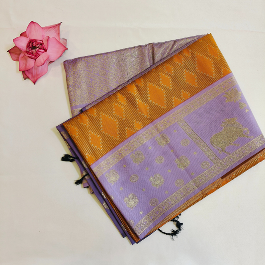 Mustard yellow soft silk saree with lavender fancy border