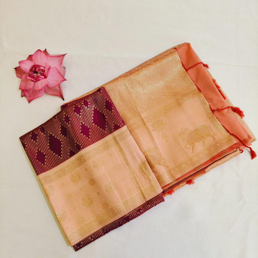 Purple soft silk saree with peach fancy border